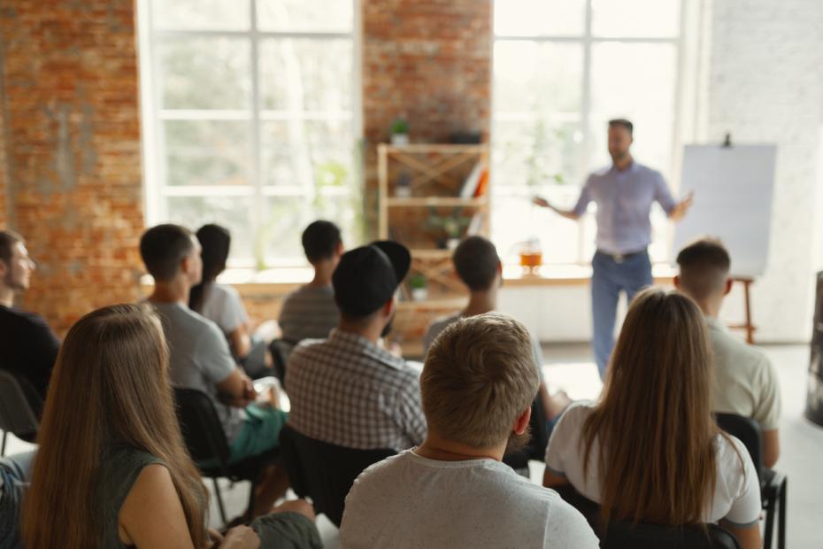 Teacher presents to group of students