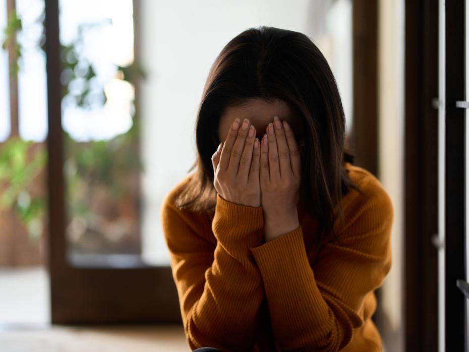 Student with her head in her hands