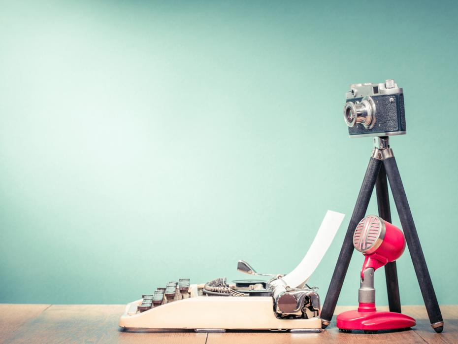 A typewriter, camera and speaker phone