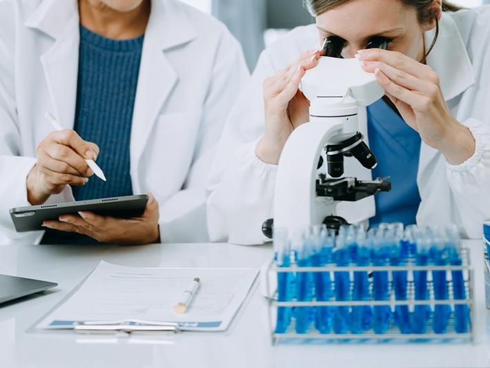 Medical researchers in white lab coats