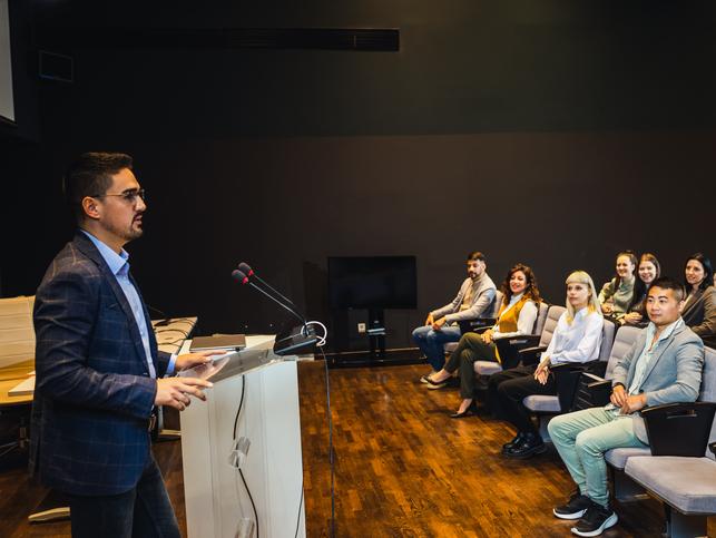 A lecturer gives a talk