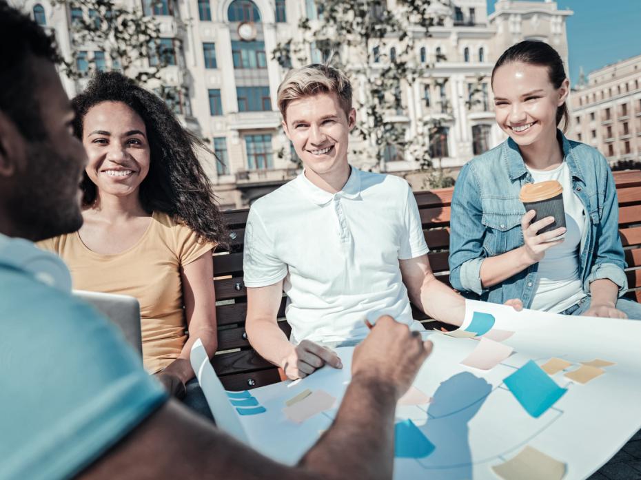 A group of four students working on a project 