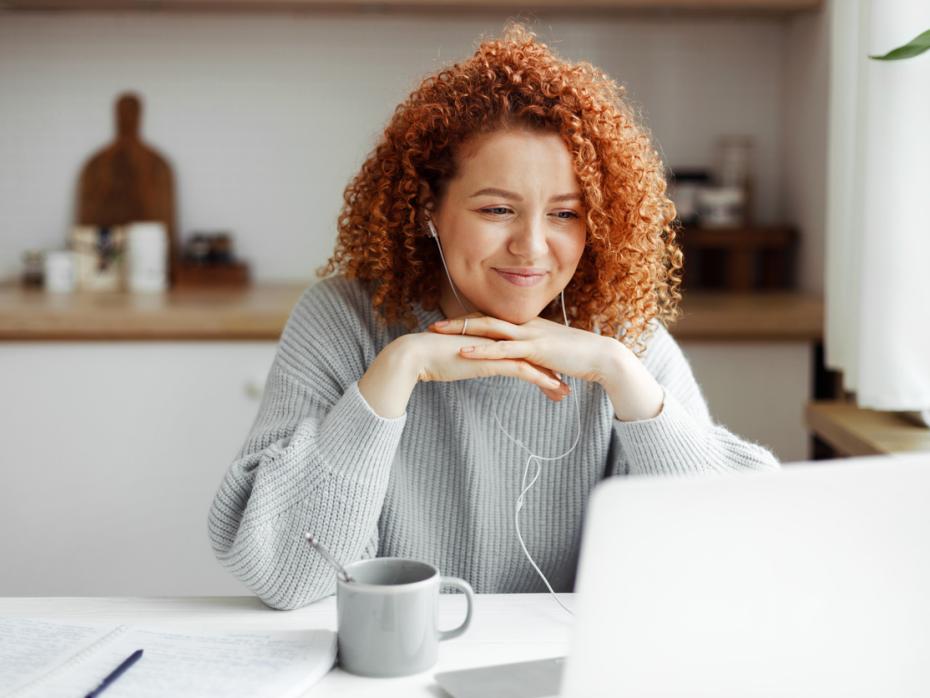 A woman studying at her laptop