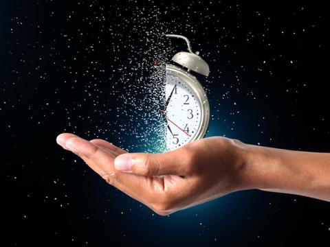 Dissolving alarm clock in hand