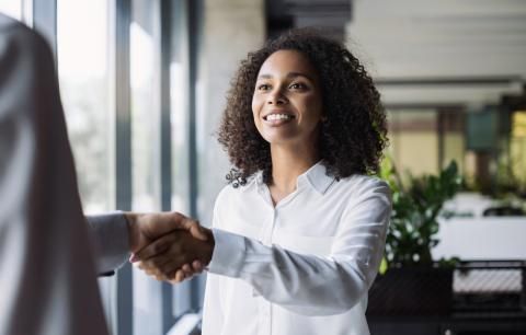 Young woman arrives for a job interview