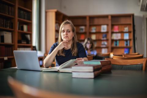 Female vision-impaired student using laptop