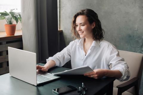 PhD student writing her dissertation