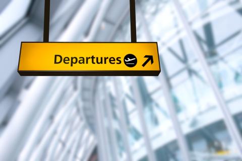 Departures sign at an airport