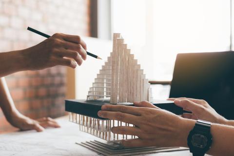 Architects working on a model