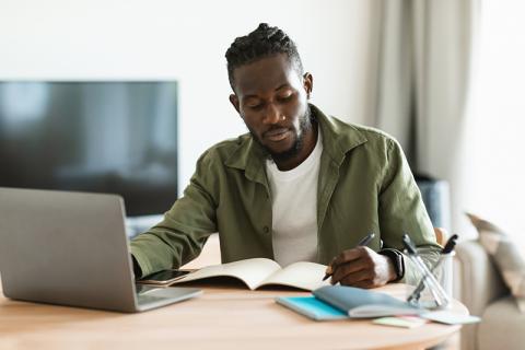 African American student studying online