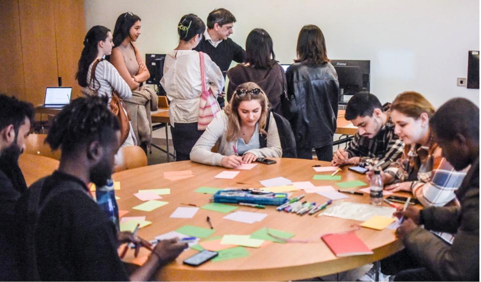 Group of student working around a table