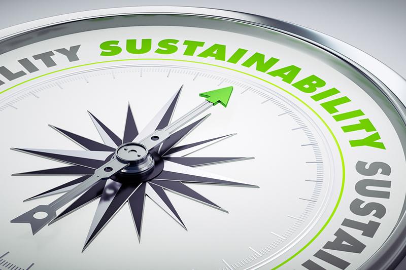 Compass pointing to sustainability