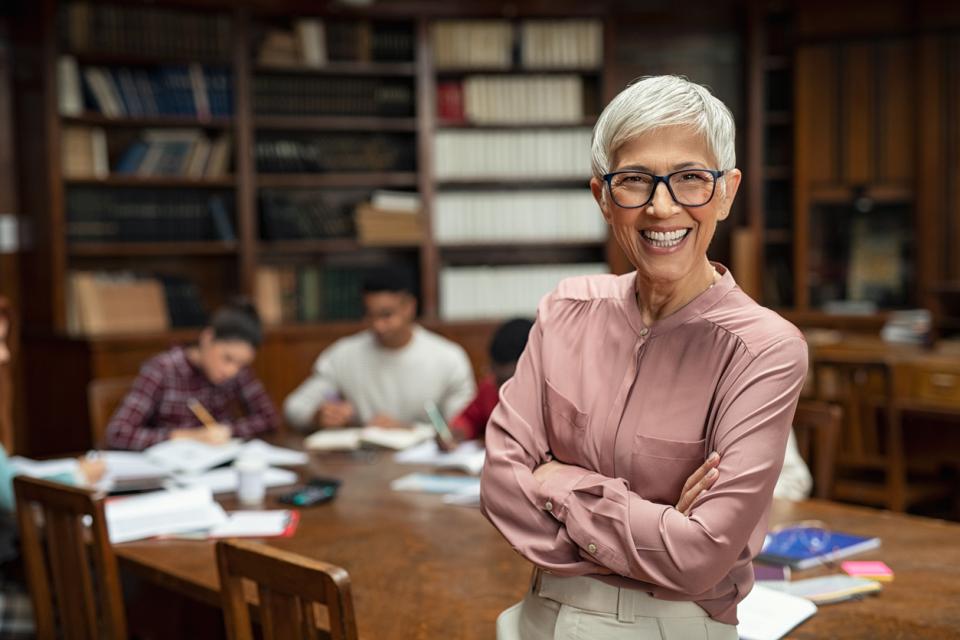 Teacher smiling at the camera