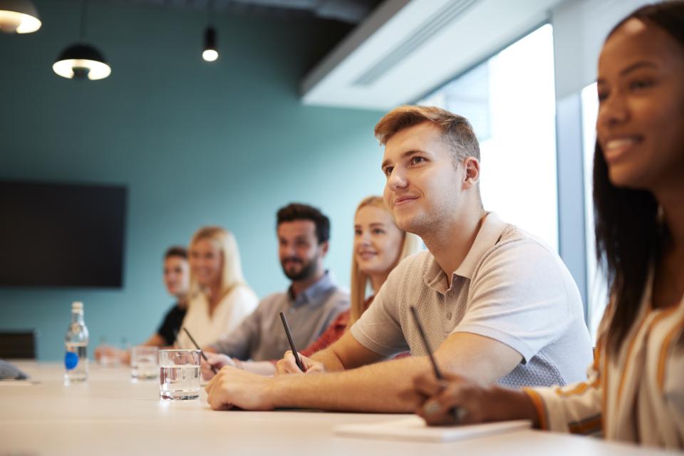 Students sitting in a business placement meeting