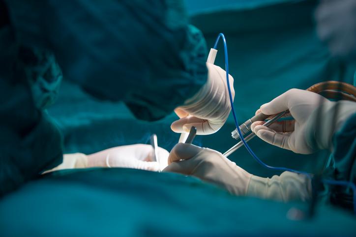 A surgery takes place in an operating theatre