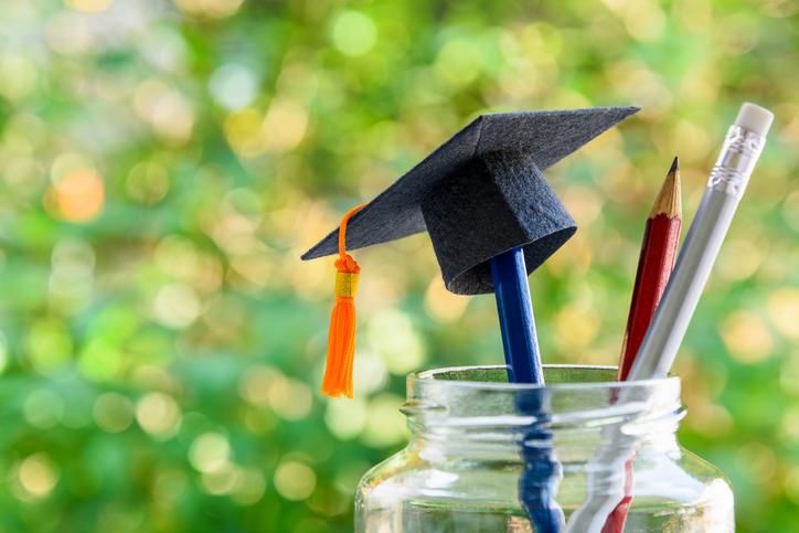 A mortarboard pencil topper