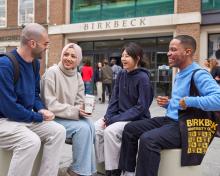 Students chat outside Birkbeck's entrance