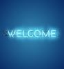 Neon blue welcome sign